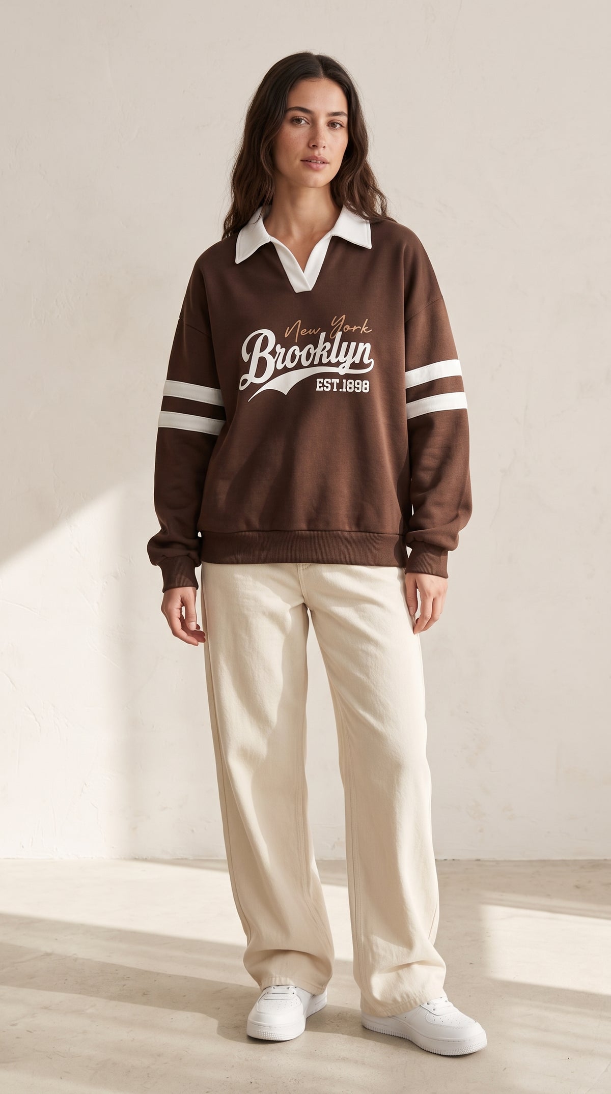 brown Brooklyn collared sweatshirt with white sleeve stripes